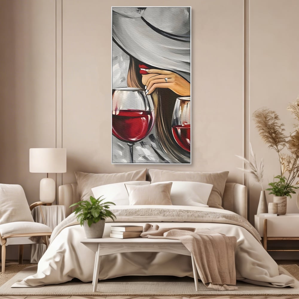 Tablou canvas cu tablou canvas cu femeie si vin rosu, in rama de aluminiu argintiu, pe perete intr-un dormitor